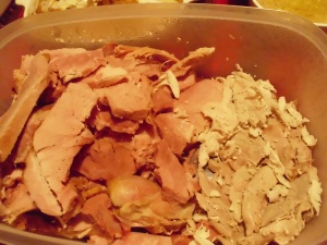 ham and remaining turkey not yet taken from carcass...in refrigerator container..